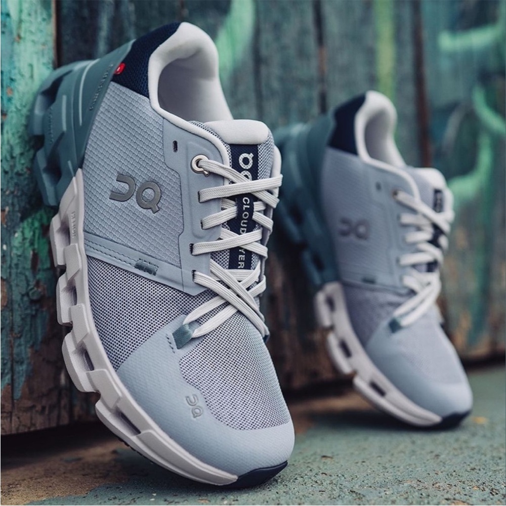 On Running Athletic Shoes in Light Blue and White